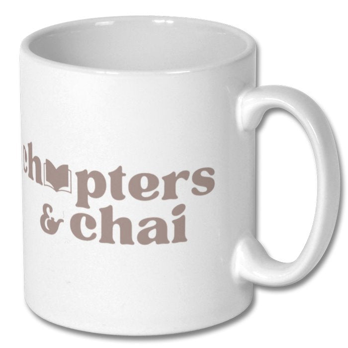 White mug with ' Chapters & Chai' text on a white background